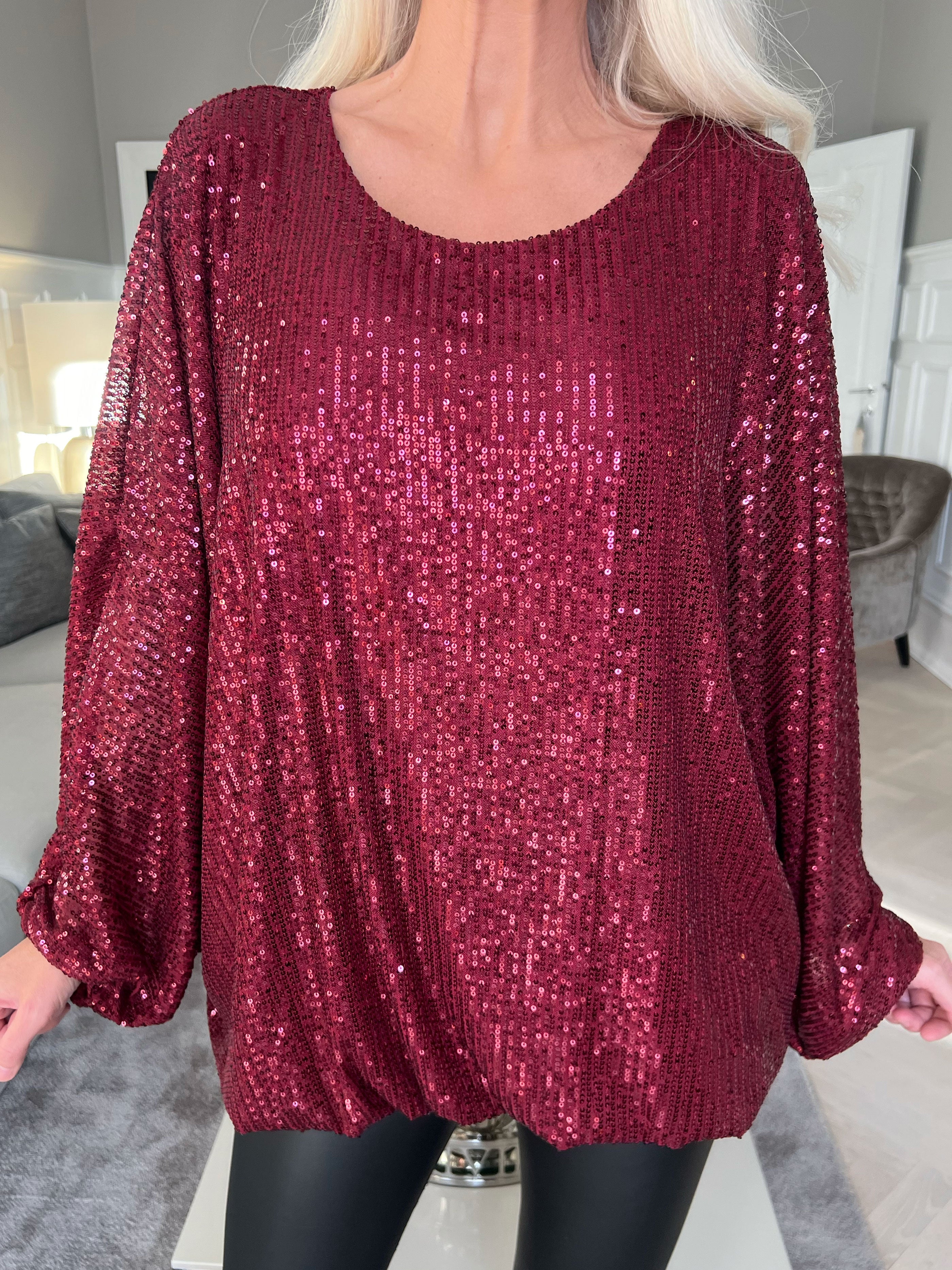 Destiny - Paljettblus med fladdermusärmar